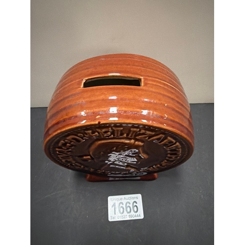 1666 - A vintage ceramic money box modeled as a large 1967 one penny coin