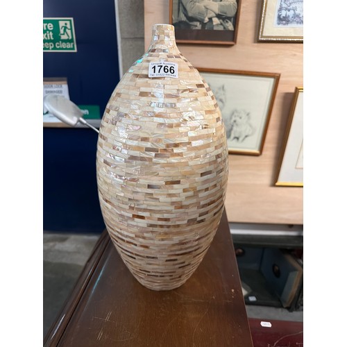 1766 - A Vietnamese mother of pearl and eggshell lacquered vase.