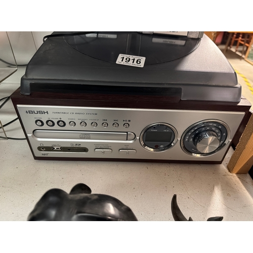 1916 - A working Bush turntable / CD radio with leads, speakers etc (CD Untested)