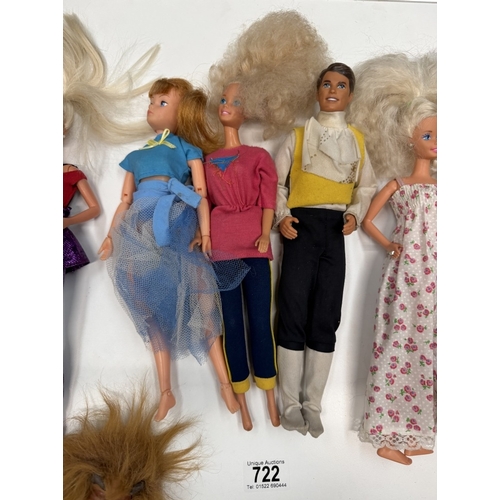 722 - 9 Barbie Dolls with clothing
