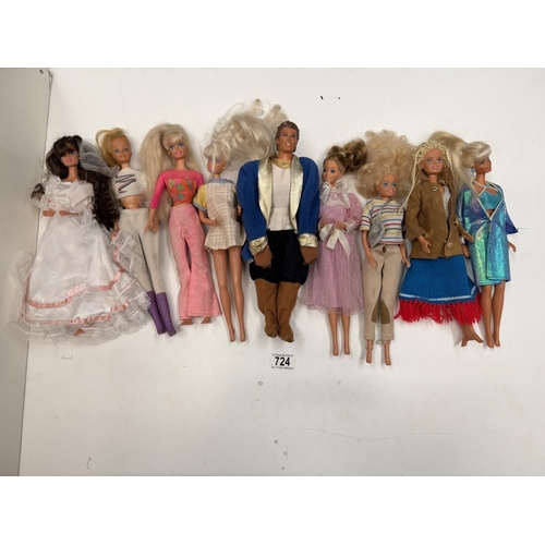 724 - 9 Barbie Dolls with clothing