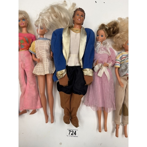 724 - 9 Barbie Dolls with clothing