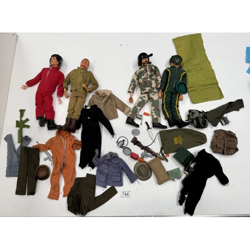 744 - 4 Vintage flock hair Action Man dolls with pistols and clothing (3 have eagle eyes)