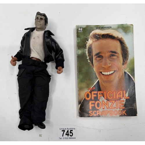 745 - A vintage Mego Corp 1976 Happy Days Fonz doll & the official Fonzie scrapbook