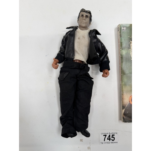 745 - A vintage Mego Corp 1976 Happy Days Fonz doll & the official Fonzie scrapbook