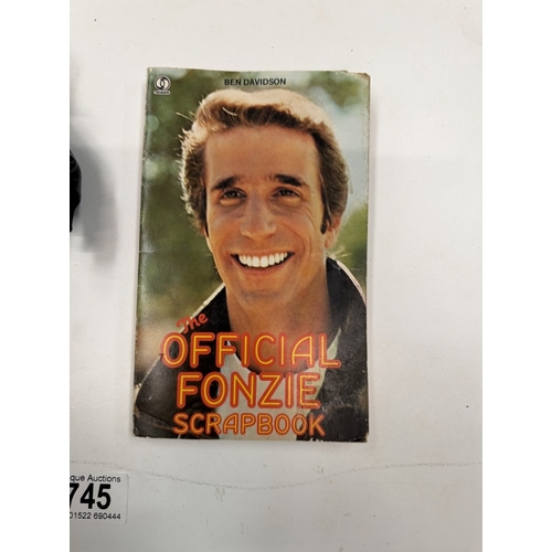 745 - A vintage Mego Corp 1976 Happy Days Fonz doll & the official Fonzie scrapbook