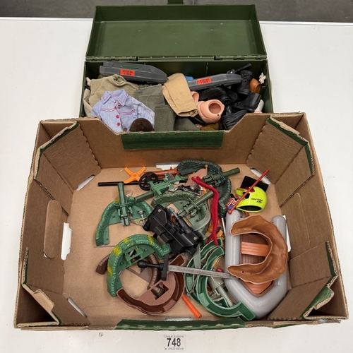 748 - An Action Man kit box & contents including body parts, clothing, accessories etc