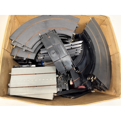 754 - A Minic Moto-Racing empty box & a large box of track (No cars)