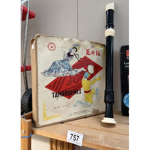 757 - A vintage boxed 9.5'' tamborine & a recorder