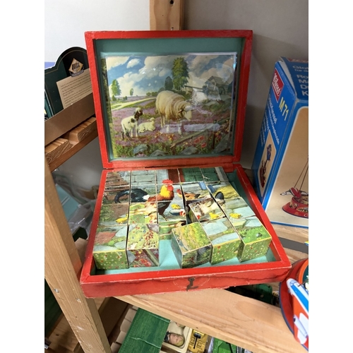 771 - A box of vintage games etc including wooden block jigsaw, boxed Wilesco roundabout etc