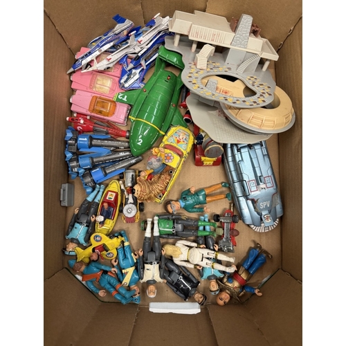 776 - A box of TV themed Diecast including Corgi Juniors , Thunderbirds, Figures etc