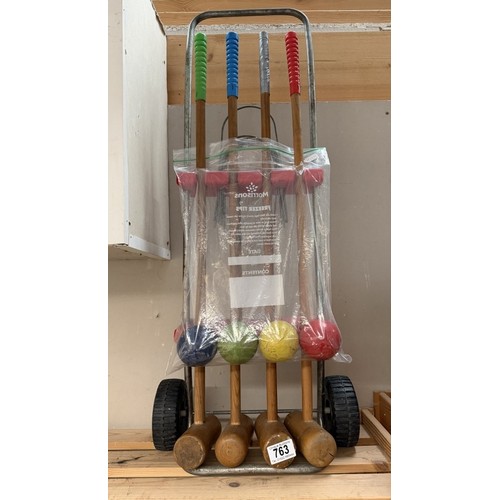 763 - A vintage garden croquette set