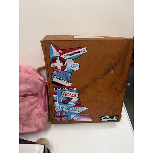 785 - A Barbie Fashion Fever case, 3 dolls, 1 other & A Sindy hotel travel case
