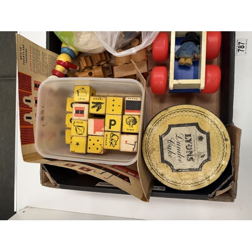 787 - A box of vintage toys including wooden building blocks, wooden trains, dolls clothes etc