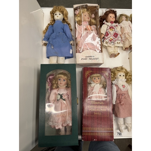 790 - A quantity of porcelain headed dolls, some boxed