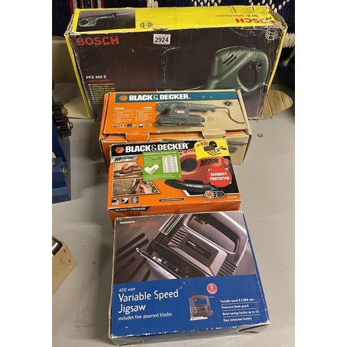 2924 - A boxed Bosch reciprocating saw, sander etc