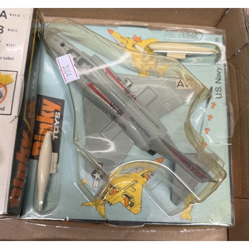809 - A Dinky Toys Spitfire MKII model aircraft & A Dinky Toys 730 U.S Navy Phantom diecast aircraft model
