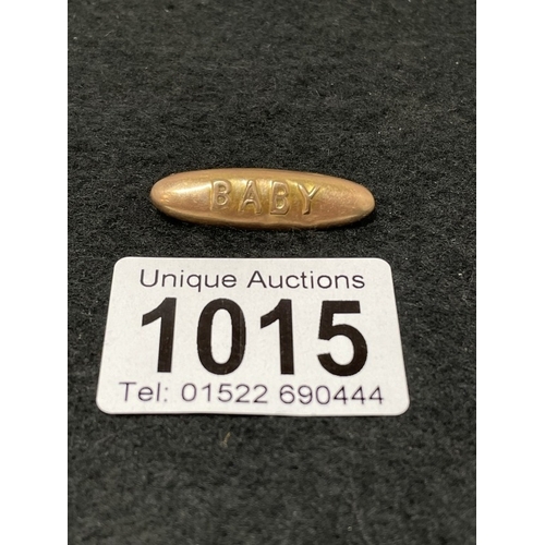 1015 - A 9ct gold BABY brooch (total weight 1.68g)