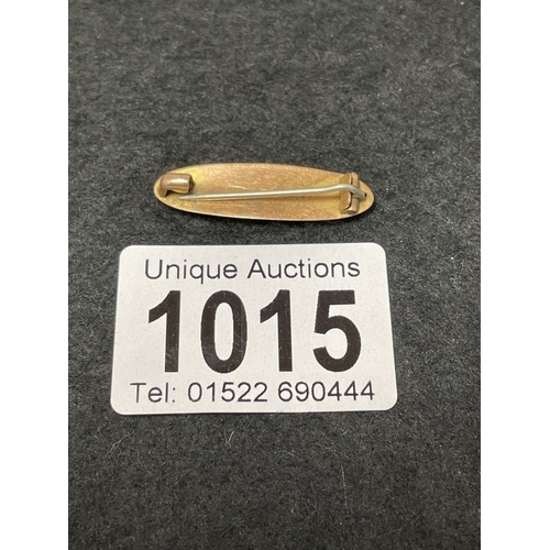 1015 - A 9ct gold BABY brooch (total weight 1.68g)