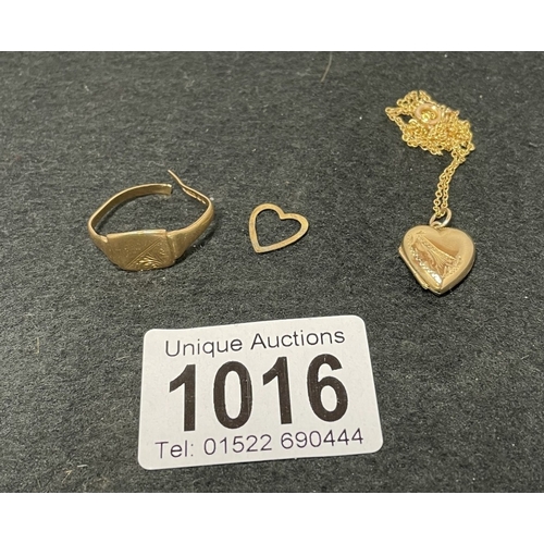 1016 - A 9ct gold heart locket and chain and a 9ct gold ring (for scrap) (total weight 5.24g)