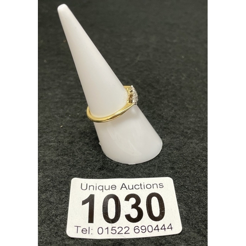 1030 - An 18ct gold and platinum trilogy diamind ring size M (total weight 2.39g)