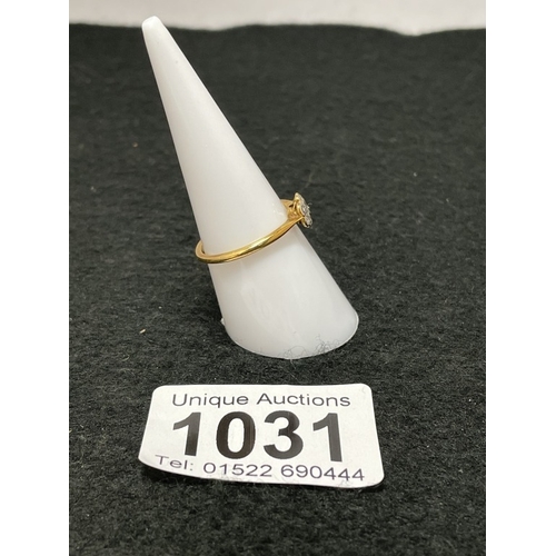 1031 - An 18ct gold and platinum daisy cluster ring size N (total weight 1.82g)