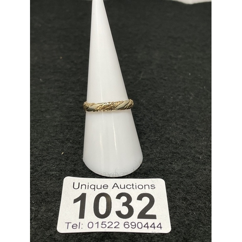 1032 - A 9ct gold braid ring size N 3/4 (total weight 2.14g)