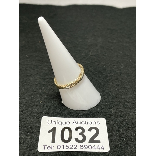 1032 - A 9ct gold braid ring size N 3/4 (total weight 2.14g)