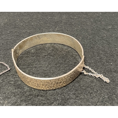 1033 - Two hallmarked Silver bangles (26g and 41.75g) and a .925 silver bangle (21.95) - total weight 89.7g
