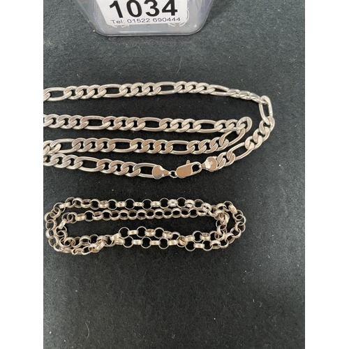 1034 - Two silver chains (43.42g and 9.91g) - total weight 53.33g