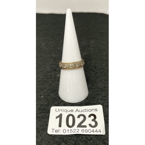 1023 - A 9ct gold spinel faceted eternity ring size M/N (total weight 2.78g)