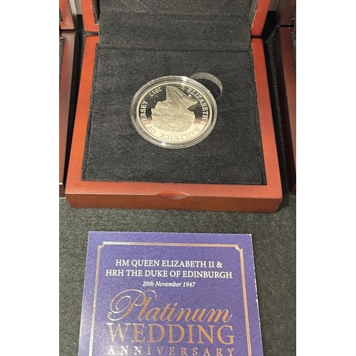 1060 - Cased silver coins including 2015 Jersey £5 Proof Coin Longest Reigning Monarch (28.28g), 2017 Jerse... 