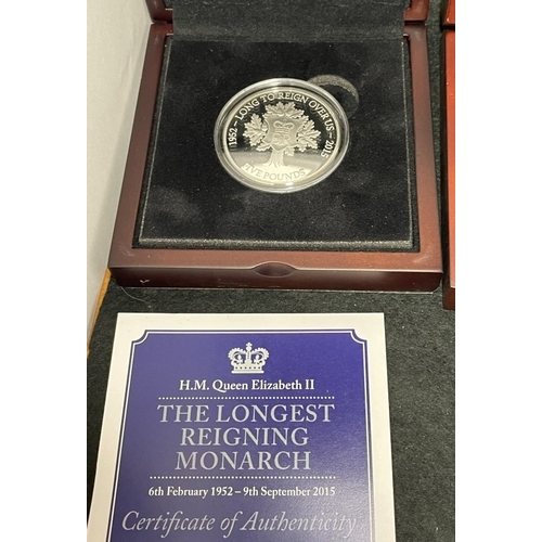 1060 - Cased silver coins including 2015 Jersey £5 Proof Coin Longest Reigning Monarch (28.28g), 2017 Jerse... 