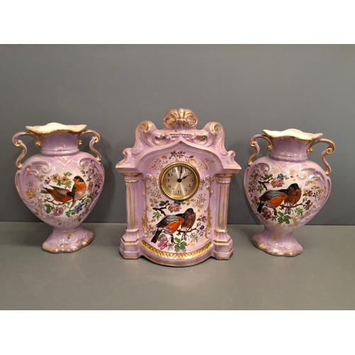 16 - Antique Porcelain mantle clock Garniture set.
Clock is working and measures 34cm high
