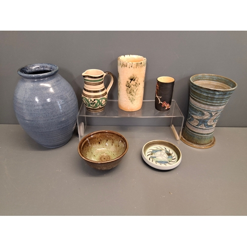 18 - A collection of Studio Pottery items. To include a Marazion vase, Buckfast Abbey bowl, buchan pin di... 