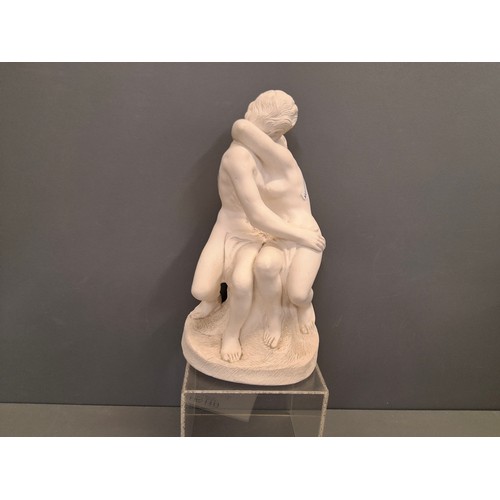 31 - A contemporary plaster marble effect sculpture of Rodins kiss
Height 22cm