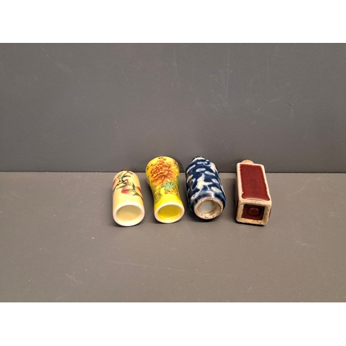 37 - Four Chinese vintage snuff bottles in various designs