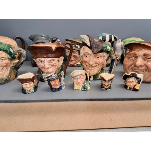38 - Collection of Royal Doulton Toby jugs to include Robin Hood & others
Eleven full size and five minia... 