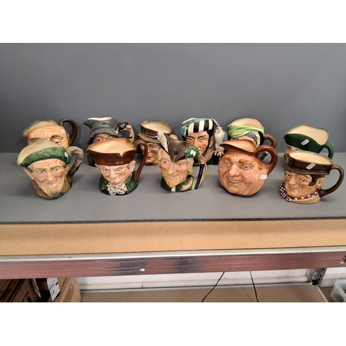 38 - Collection of Royal Doulton Toby jugs to include Robin Hood & others
Eleven full size and five minia... 