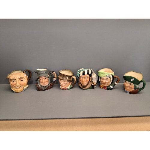 38 - Collection of Royal Doulton Toby jugs to include Robin Hood & others
Eleven full size and five minia... 