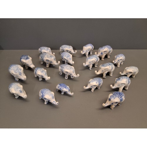 49 - Collection of 20 miniature porcelain elephants.