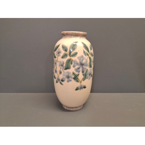 55 - Cobridge stoneware periwinkle pattern vase.
Height 21.5cm
