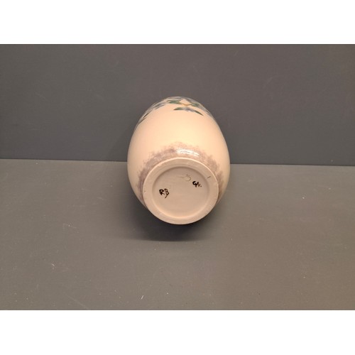 55 - Cobridge stoneware periwinkle pattern vase.
Height 21.5cm