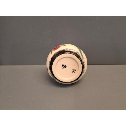 56 - Cobridge stoneware squat vase In the Corncockle pattern.
Height 9.5cm