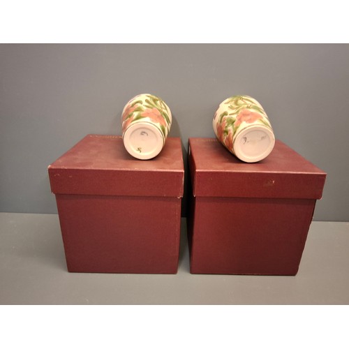 58 - Two Cobridge Foxgloves pattern vases.
Height 16cm with boxes