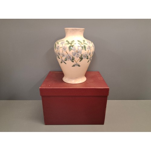 59 - Cobridge stoneware Periwinkle pattern Vase.
Height 26cm with box