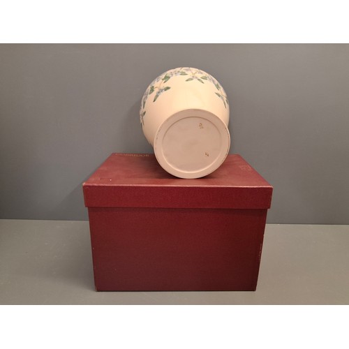 59 - Cobridge stoneware Periwinkle pattern Vase.
Height 26cm with box