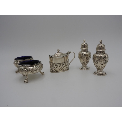 199 - PAIR OF GEORGE II SILVER SALTS LONDON 1742 with repousse decoration raised on three shell cast paw f... 