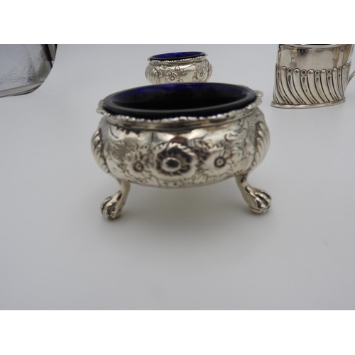 199 - PAIR OF GEORGE II SILVER SALTS LONDON 1742 with repousse decoration raised on three shell cast paw f... 