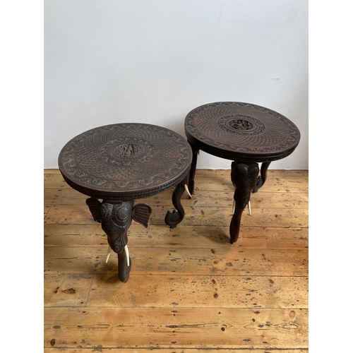 2 - PAIR OF CARVED INDIAN HARDWOOD OCCASIONAL TABLES CIRCA 1900,THE CIRCULAR TOPS CARVED ON ELEPHANT FOR... 